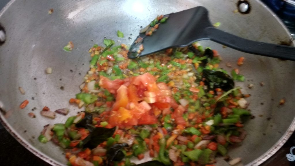 Adding tomato