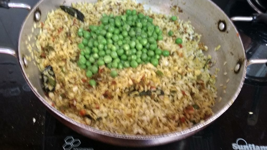 Adding Boiled peas to the mixture