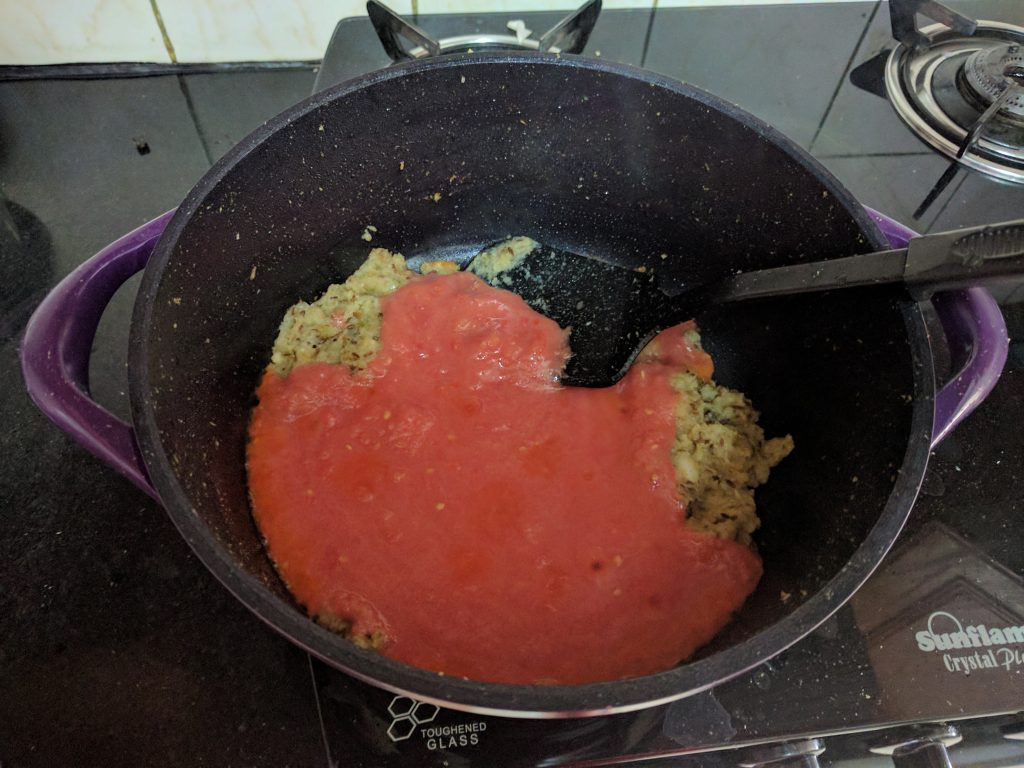 Tomato Puree adding to the gravy