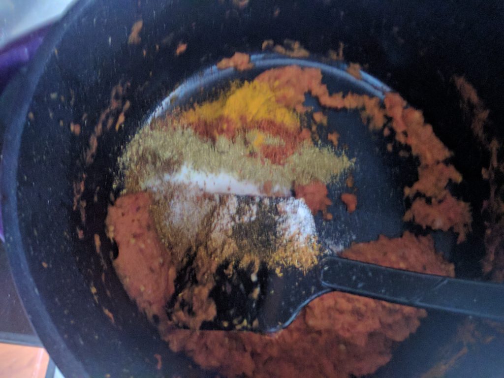 Adding Spices to the paste