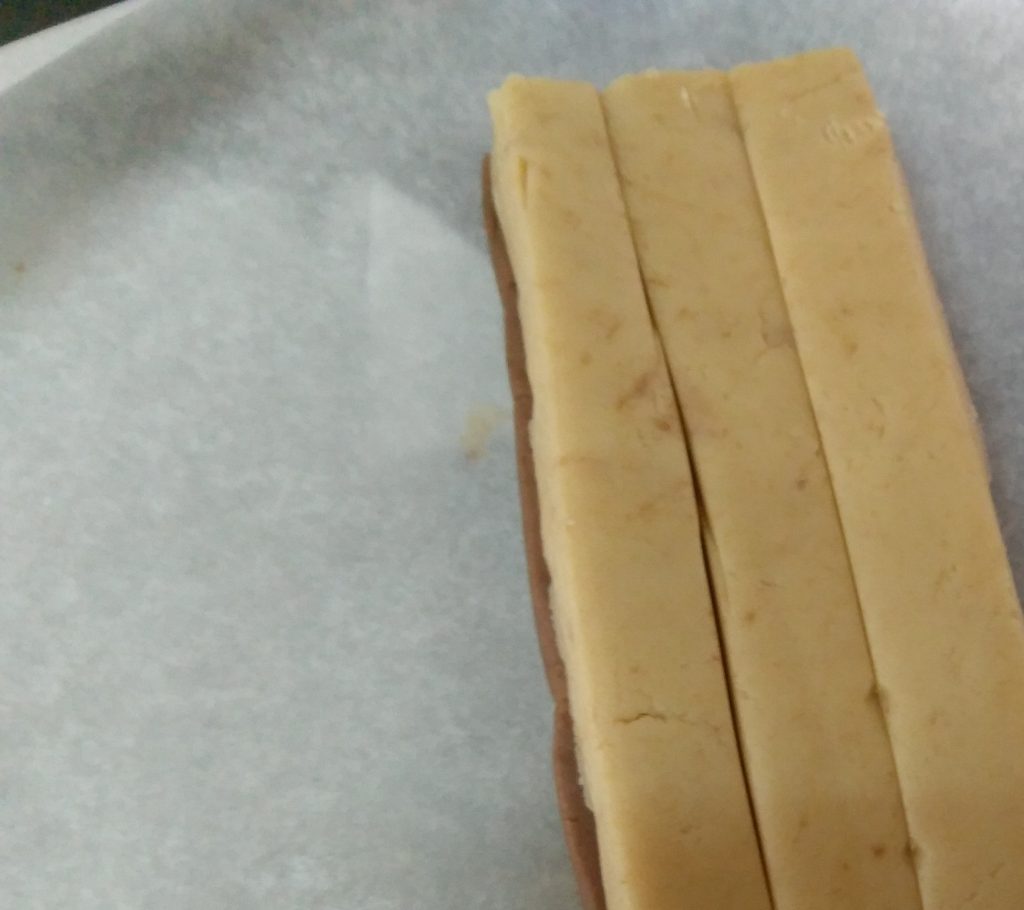 Vanilla Dough Slab cut lengthwise into 3 equal stripes
