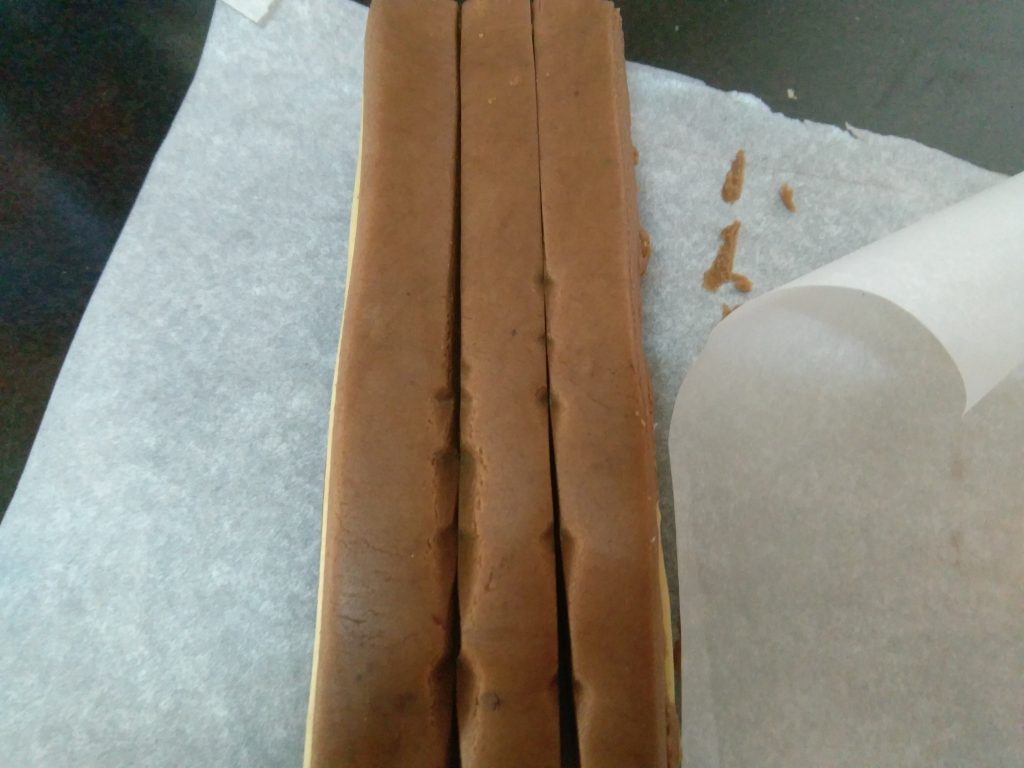 Chocolate Dough Slab cut lengthwise into 3 equal stripes