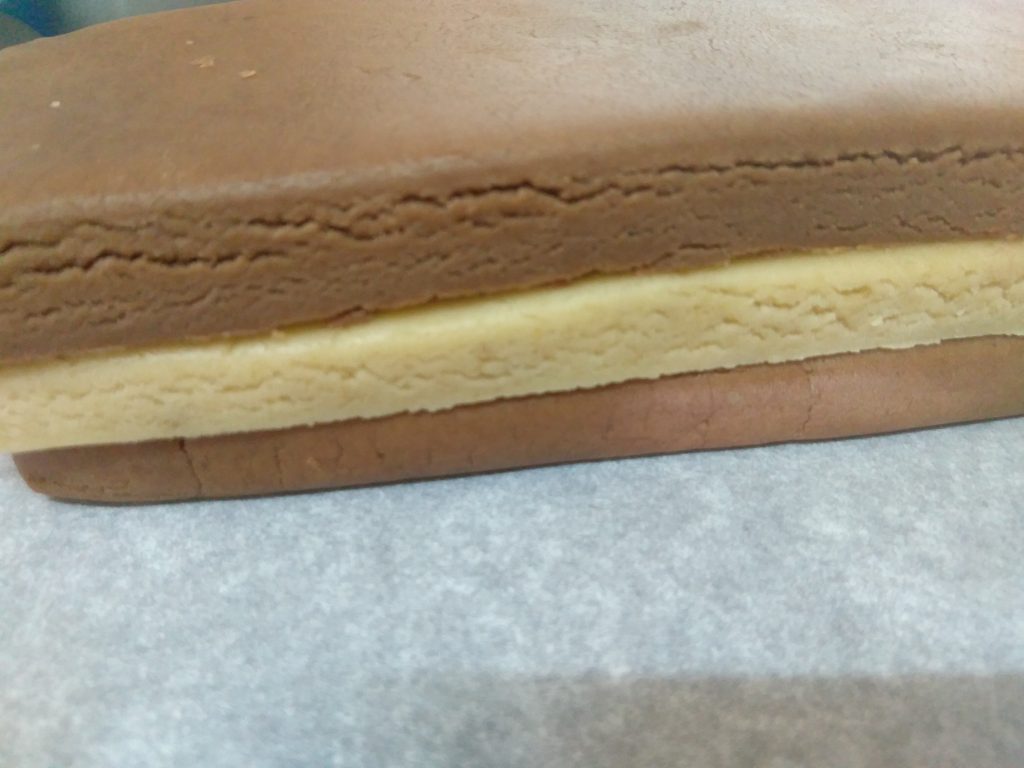 Vanilla slab sandwiched between two Chocolate slabs