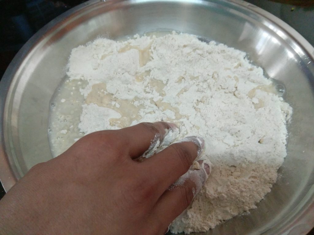 Adding water to Flour