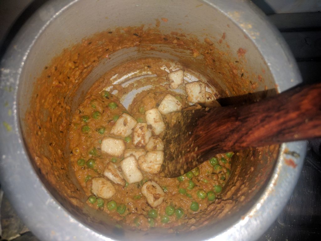Adding Paneer Cubes and Fresh Green Peas